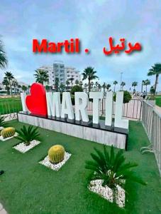 a sign for marilah marilimum at a resort at Apartment 20m from Martil beach in Tetouan