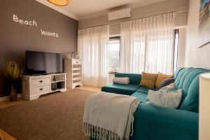 Televisyen dan/atau pusat hiburan di Beach Waves