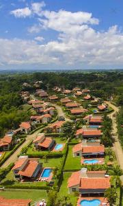 an aerial view of a village with houses andyards at Fincas Panaca Herreria 26 in Quimbaya