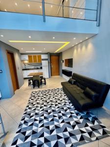 Area soggiorno di Saint Sebastian Flat 616 - Com Hidro! até 3 pessoas, Duplex, no centro