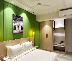 Kama o mga kama sa kuwarto sa Hotel Wonder Hills,Har ki Pauri Road Haridwar