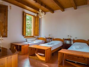 Postel nebo postele na pokoji v ubytování B&B Villa Erika