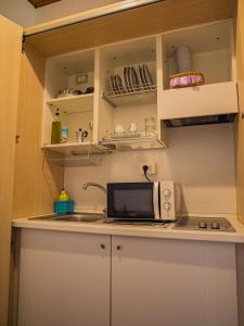 Kuchyň nebo kuchyňský kout v ubytování B&B Villa Erika