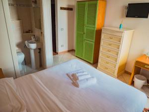 Postel nebo postele na pokoji v ubytování B&B Villa Erika