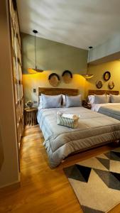 Säng eller sängar i ett rum på Muuk Boutique Hotel Campestre