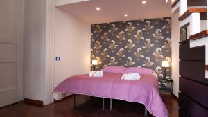 A bed or beds in a room at Casa Latilla