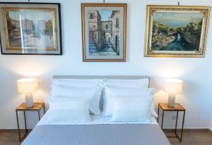 Postel nebo postele na pokoji v ubytování Casa Don Giovanni - Amazing View