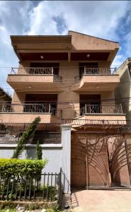 a building with balconies on top of it at METRO Deluxe Specious Home in a Great Neighborhood!! in Addis Ababa