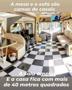a camper van with a checkered floor at Experiência num Luxuoso Motorhome in São Roque