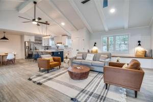 a living room with a couch and a table at Cozy Texoma Hideaway with Tanglewood Resort Access in Pottsboro