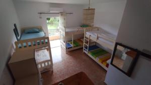 Postel nebo postele na pokoji v ubytování Oasis Hostel
