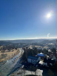 a view of a city with a road and buildings at Premium Apartment 70qm 2,5 Zimmer Küche, Smart TV, Garage, WiFi in Heidenheim an der Brenz