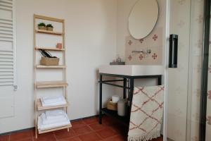 a bathroom with a sink and a mirror at La Bella Vita Lecce in Lecce +41 photos