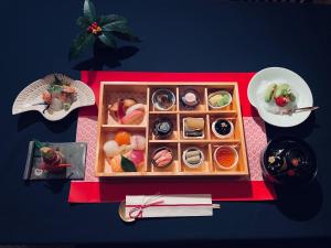a table with a tray of food on top at Ryokan Tsukie - Vacation STAY 14504v in Kyoto