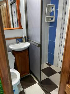 Koupelna v ubytování Habitación La Amelia