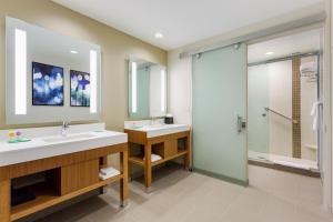 a bathroom with a sink, toilet, and bathtub at Hyatt Place Chicago/Downtown - The Loop in Chicago