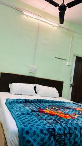 Lova arba lovos apgyvendinimo įstaigoje Aashapurti Hotel