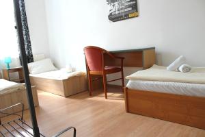 Broadway City Guesthouse客房内的一张或多张床位