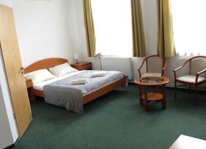 Broadway City Guesthouse客房内的一张或多张床位