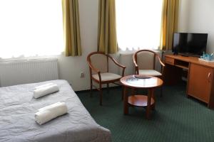 Broadway City Guesthouse客房内的一张或多张床位