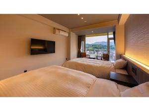 Μια τηλεόραση ή/και κέντρο ψυχαγωγίας στο Mikuma Hotel - Vacation STAY 63485v