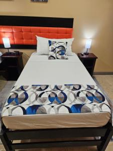 Postel nebo postele na pokoji v ubytování Beres Vale Apartments