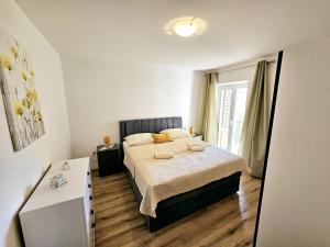 Posteľ alebo postele v izbe v ubytovaní Beachfront 5BR Home Victoria