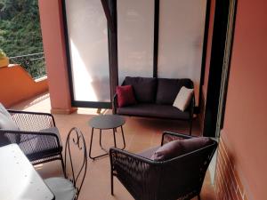 A seating area at Villa Vittorio - Splendid panoramic sea view terrace
