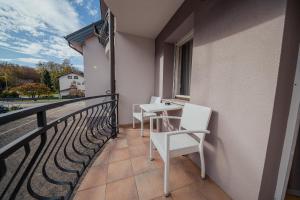 Balkón nebo terasa v ubytování Hotel Maj Inn