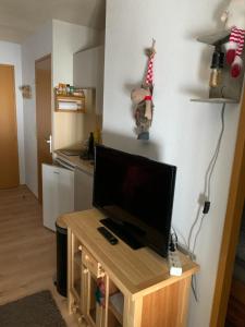 Kuchyňa alebo kuchynka v ubytovaní Charmant appartement avec parking privé dans une petite résidence très calme