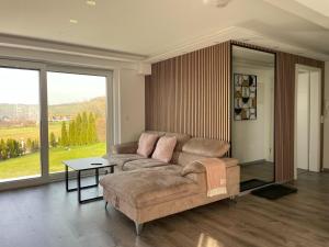 Posezení v ubytování Apartments Metzingen Panoramablick