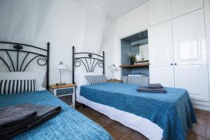 Postelja oz. postelje v sobi nastanitve Casa del Mar