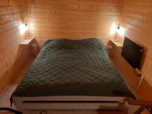 Postel nebo postele na pokoji v ubytování Srebrny Domek