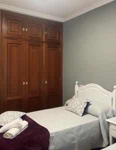 Ένα ή περισσότερα κρεβάτια σε δωμάτιο στο O fogar do camiñante