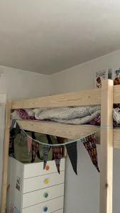 a bedroom with a bunk bed with flags on it at ApartmentInCopenhagen Apartment 1538 in Copenhagen