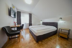 Postel nebo postele na pokoji v ubytování Hotel Maj Inn + 37 fotografií