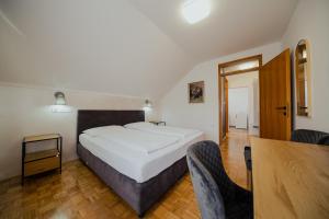 Postel nebo postele na pokoji v ubytování Hotel Maj Inn