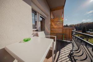 Balkón nebo terasa v ubytování Hotel Maj Inn