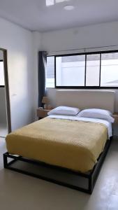 Katil atau katil-katil dalam bilik di Caribbean View - Roosevelt #2