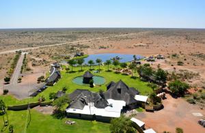 an aerial view of a house in the middle of the desert at Lapa Lange Game Lodge in Mariental