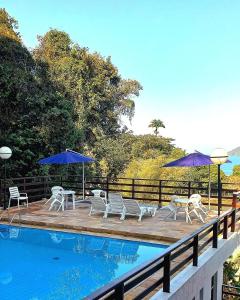 A piscina localizada em Apartamento Ubatuba Terraços da Prainha Vista Mar ou nos arredores
