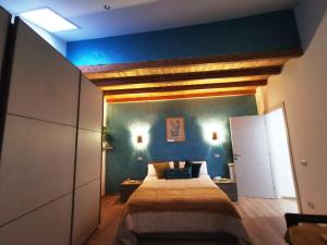 Postel nebo postele na pokoji v ubytování LA TORRETTA apartment suite