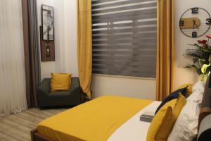 Säng eller sängar i ett rum på Villas Libdo Immo