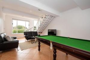a living room with a pool table in it at Casa Estiva in Rye +23 photos