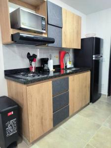 Eldhús eða eldhúskrókur á Apartaestudio completo en Itagüí - Shalom