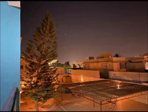 a christmas tree on the roof of a building at Atlantis in Nouakchott