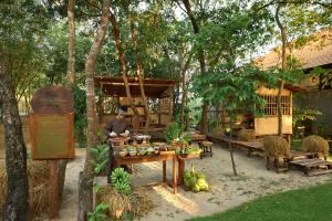 Ein Garten an der Unterkunft Green Bay Phu Quoc Resort & Spa