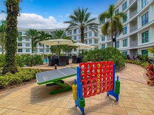 a playground in front of a large building at 1Bed/1Bath Pet Friendly Condo at the Melia in Orlando