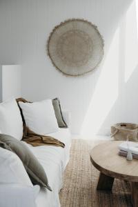 A bed or beds in a room at Salt at Shoal Bay