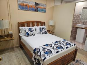 Postel nebo postele na pokoji v ubytování Beres Vale Apartments